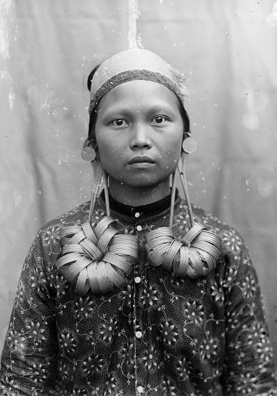 Portrait of a Kenya Dayak woman, Apo Kajan, Central Borneo. 1919.  Photographer: