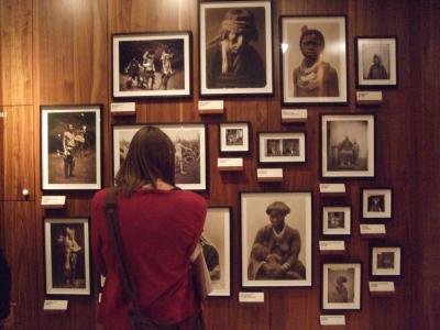 Sepia tinted photographs in a display in the Medicine Man Gallery 